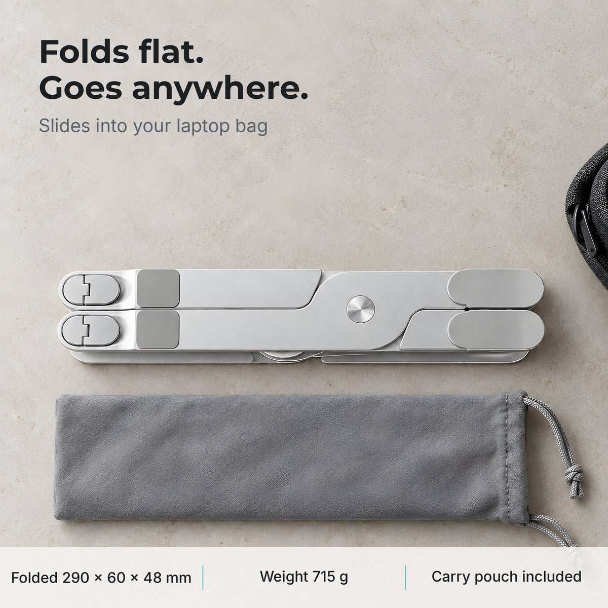 Axis laptop stand folds flat to 290 x 60 x 48 mm, weighs 715 g, carry pouch included
