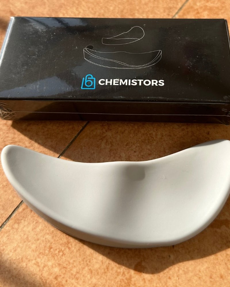 A Chemistors box printed with the brand logo, next to the product it ships with