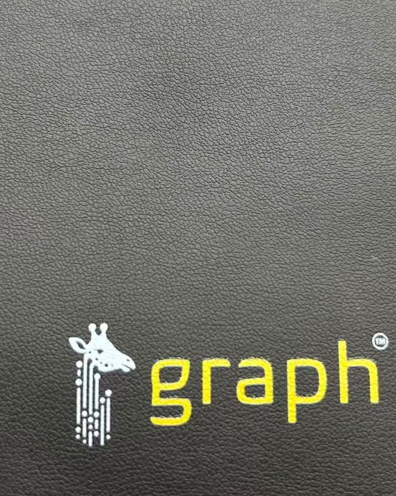 The Graph AI logo printed in full colour on a black Chemistors laptop sleeve