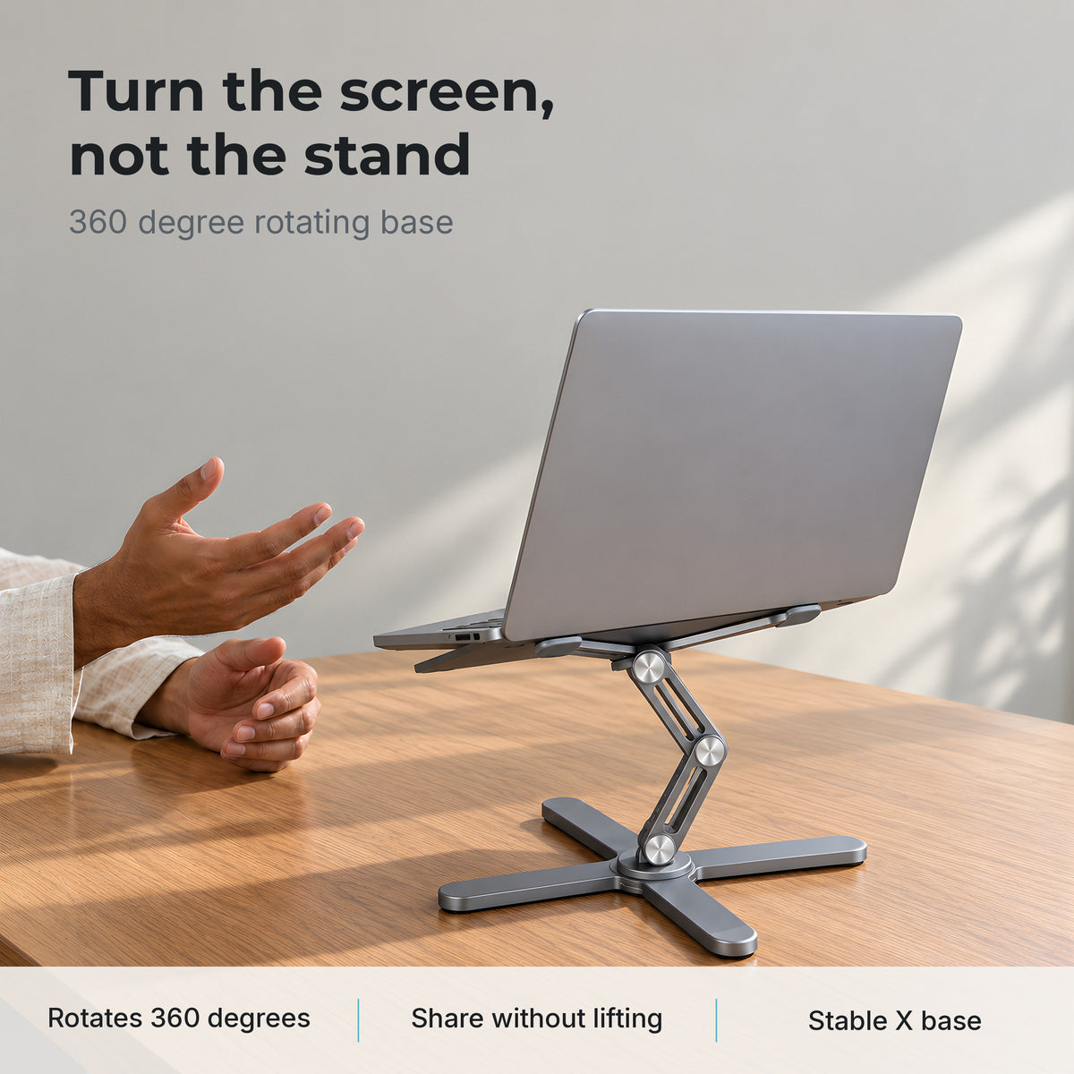 Axis laptop stand turns 360 degrees to share the screen without lifting it